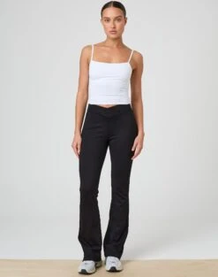 Twist Front Cut Out Long Sleeve Knit Top -Swoon Fashion christy v front ponte pant black front pw48072pont 1