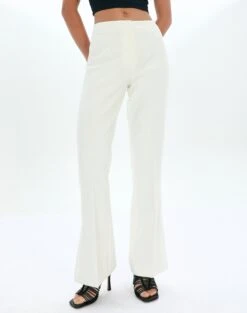 Twist Front Cut Out Long Sleeve Knit Top -Swoon Fashion harris tailored pant milk front pw85797pln