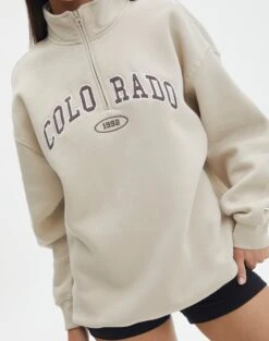 Oversized Embroidered Quarter Zip Sweater -Swoon Fashion olivia oversized quarter zip coloradowhat the shell imageback tl97172oemb